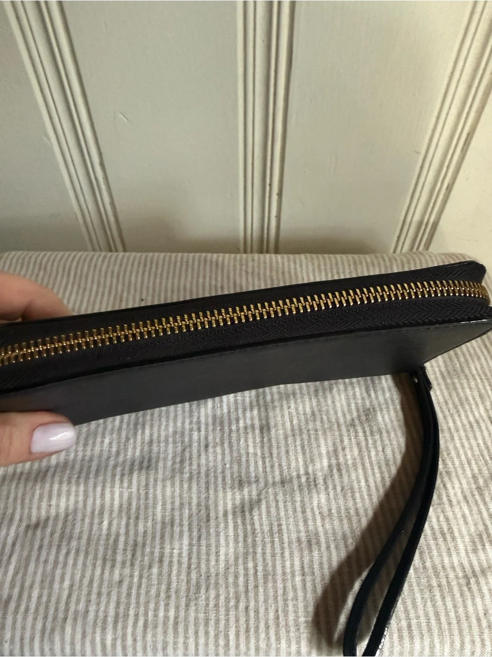 kate spade black zip-around wristlet wallet with gold logo